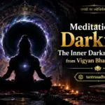 Meditator sitting in darkness practicing inner awareness